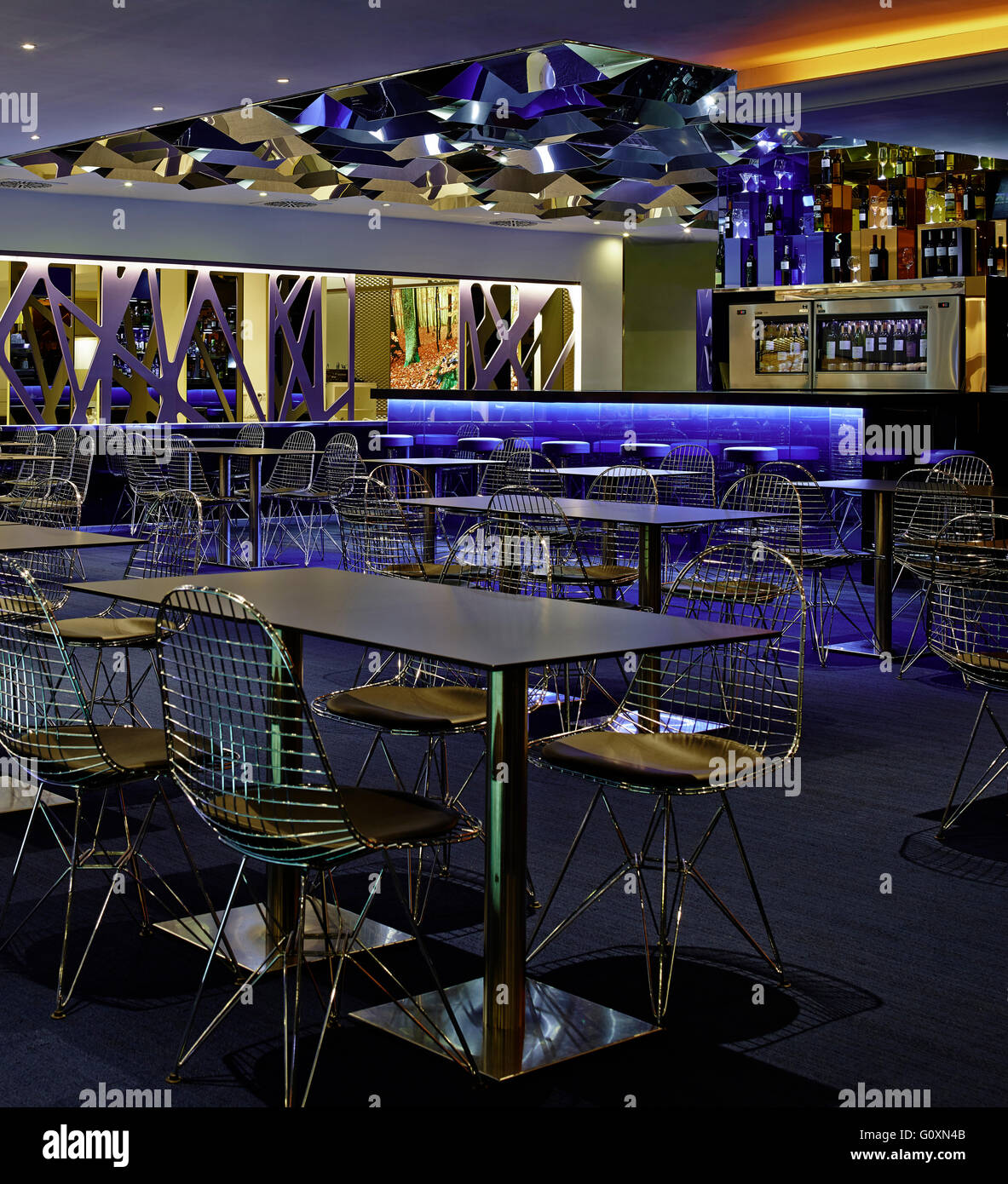 Casino Barcelona, the interior, shiny surfaces, light reflections. Tables and chairs. Stock Photo