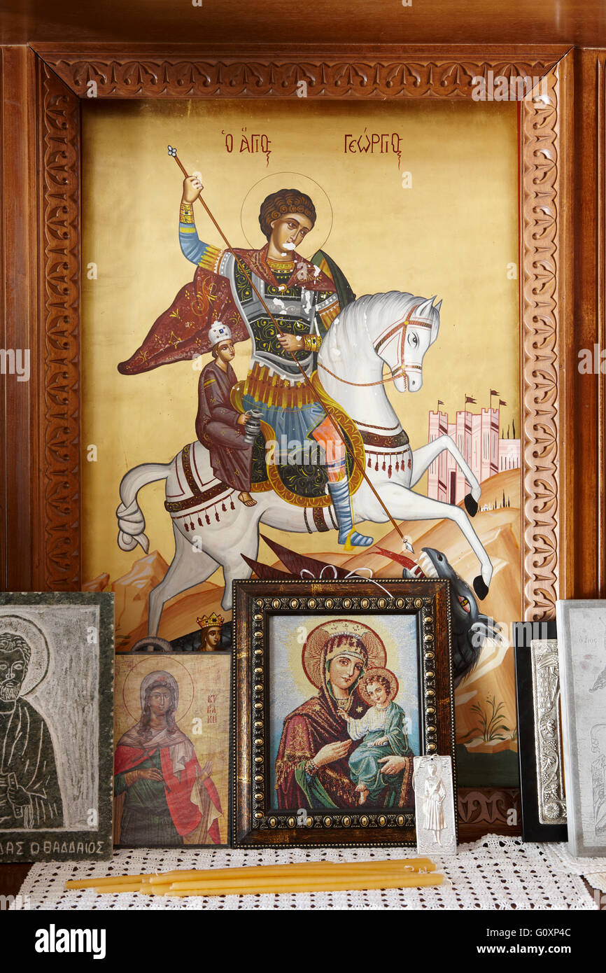Byzantine iconography inside a cretan church. Vertical Stock Photo