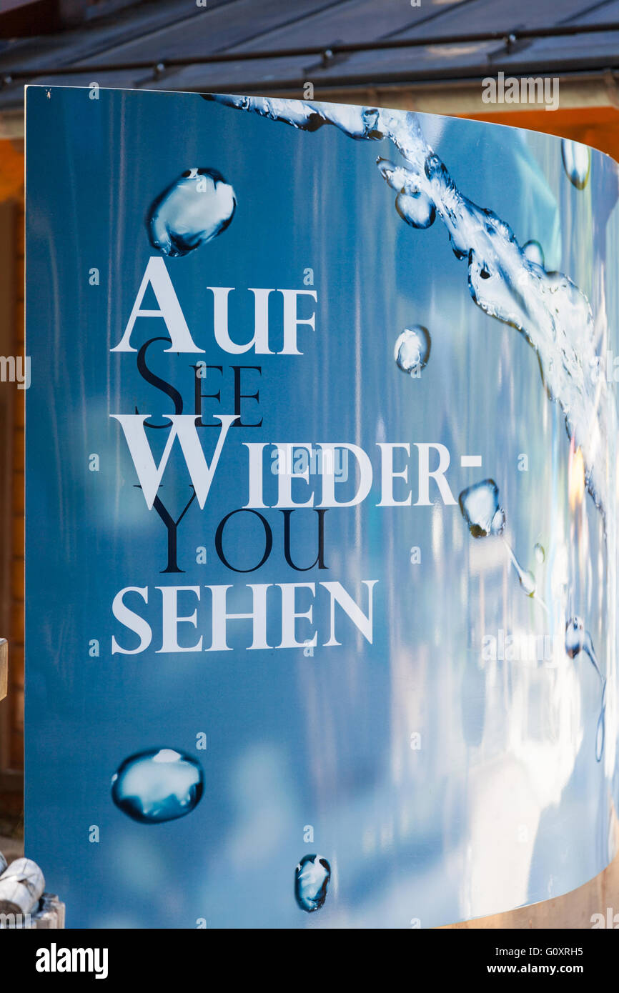 A sign saying 'Auf Wiedersehen' at the exit to the Krimml Waterfalls Hohe Tauern National Park Austria Europe Stock Photo