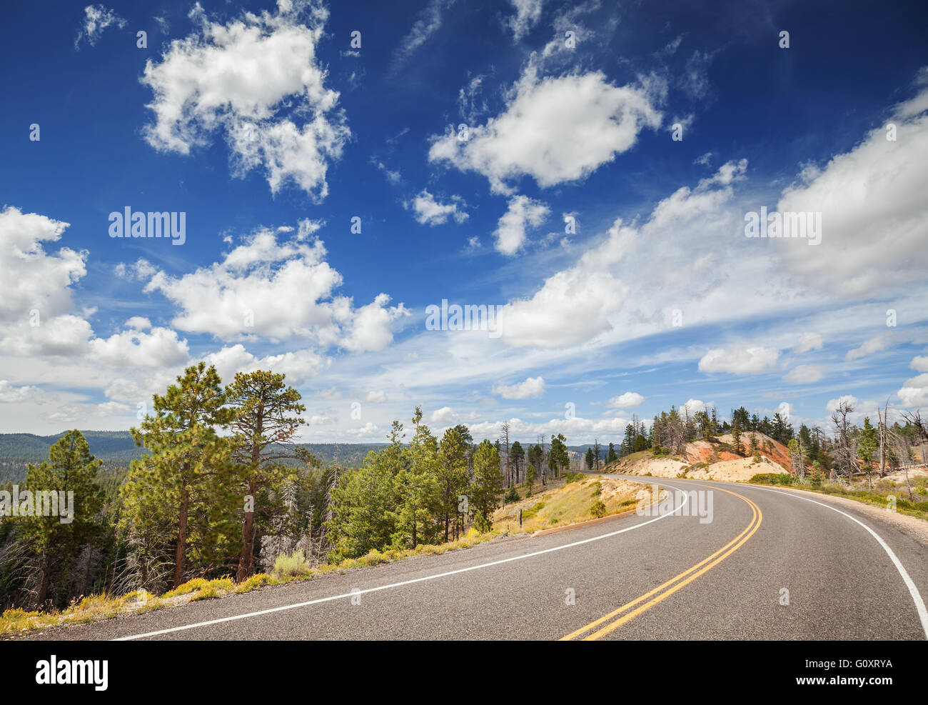 Scenic road with beautiful cloudscape, Bryce Canyon National Park, Utah, USA. Stock Photo