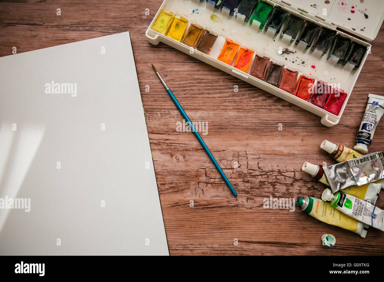 Paper, Watercolors, Paint Brush and Markers on Wooden Table Stock Photo -  Image of draw, white: 81399578
