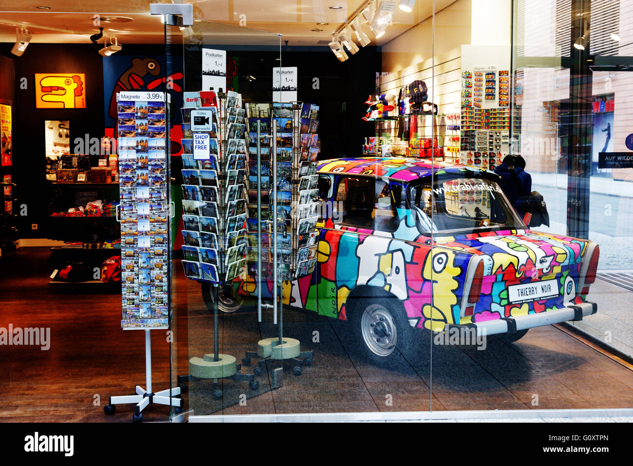 A coloured Trabant car inside a souvenir shop in the Arkaden shopping mall near Potsdamerplatz, Berlin Stock Photo