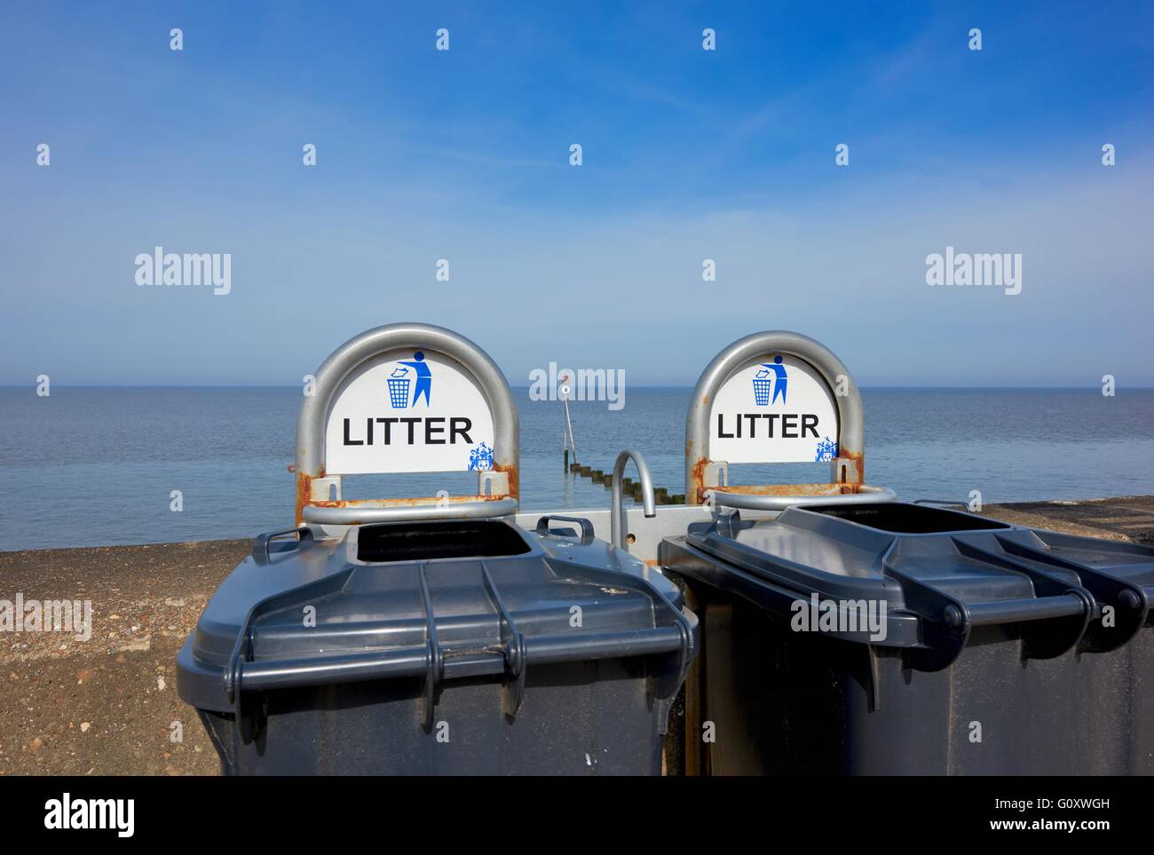 Seafront litter wheelie bins Hunstanton Norfolk England UK Stock Photo