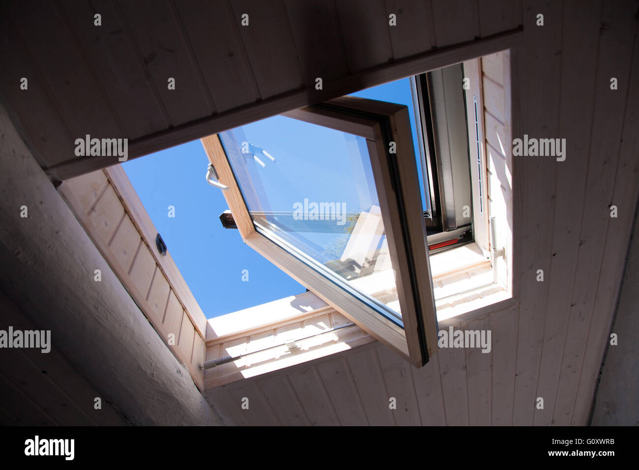 roof open window from indoor with blue sky, wooden ceiling Stock Photo Alamy