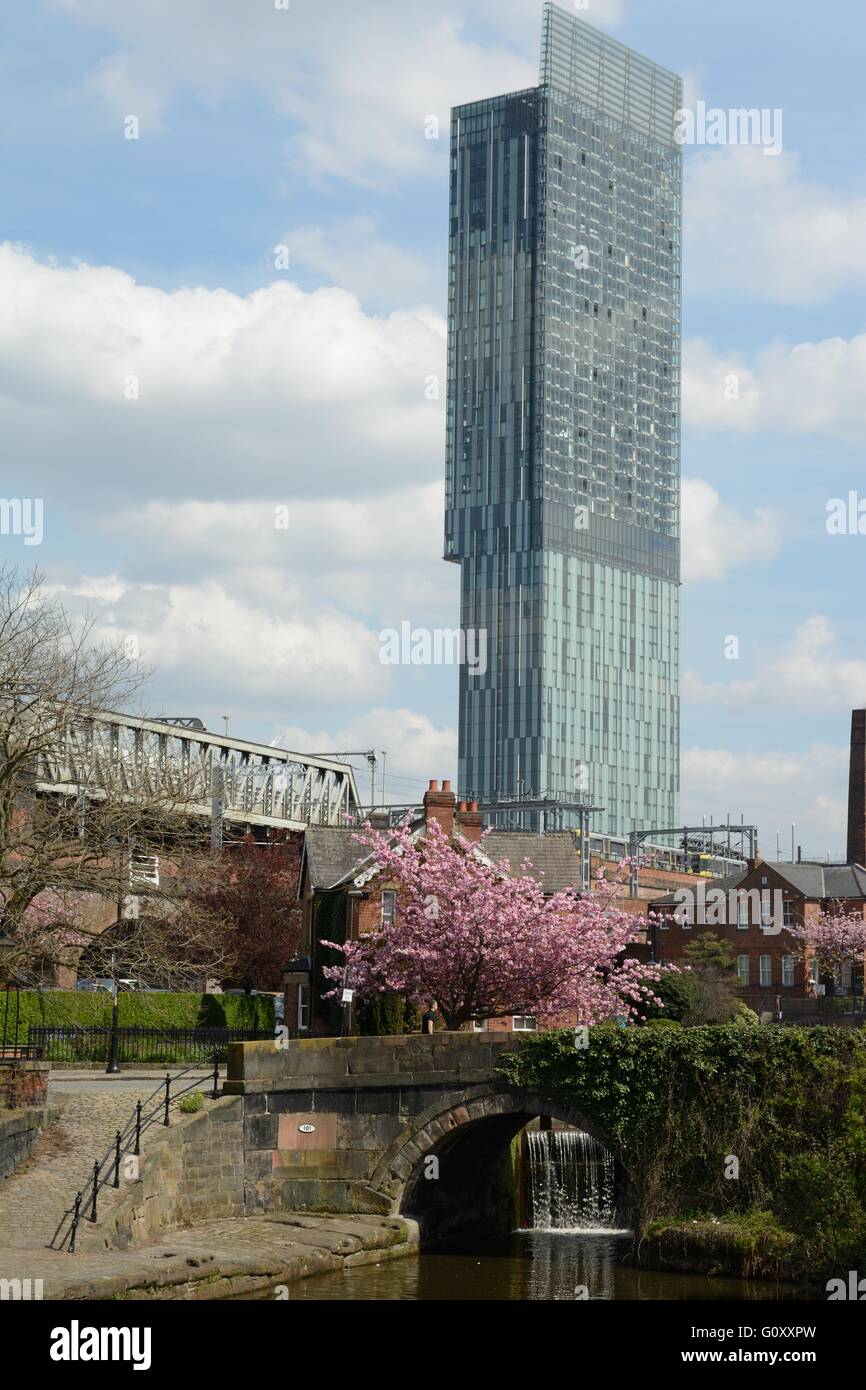 The canal network in the Castlefield district of central Manchester overlooked by Beetham Tower. Stock Photo