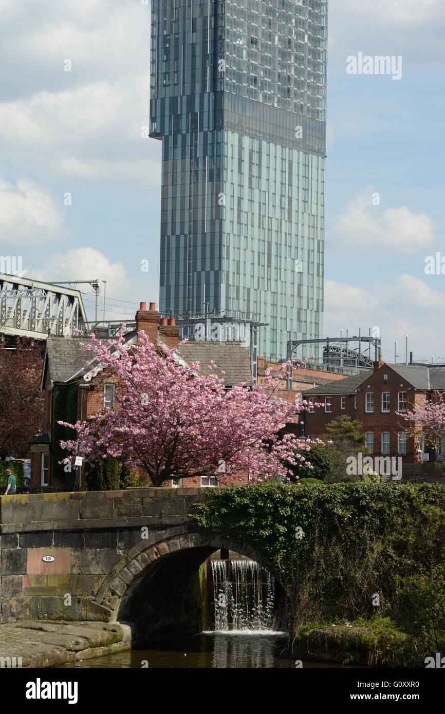 The canal network in the Castlefield district of central Manchester overlooked by Beetham Tower. Stock Photo