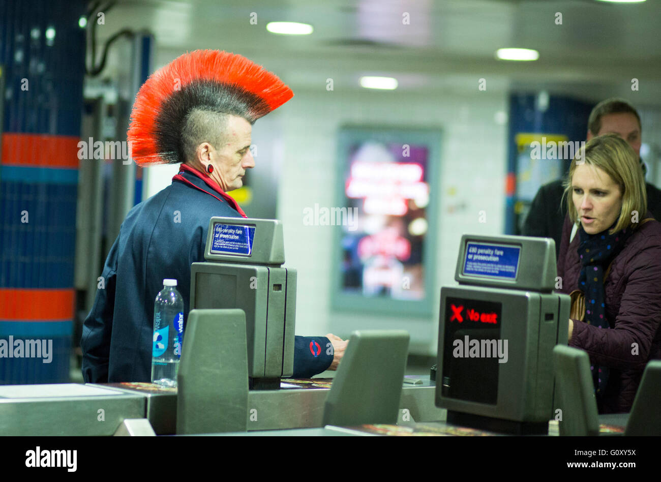 Tube underground worker hairstyle mohican mohawk Stock Photo
