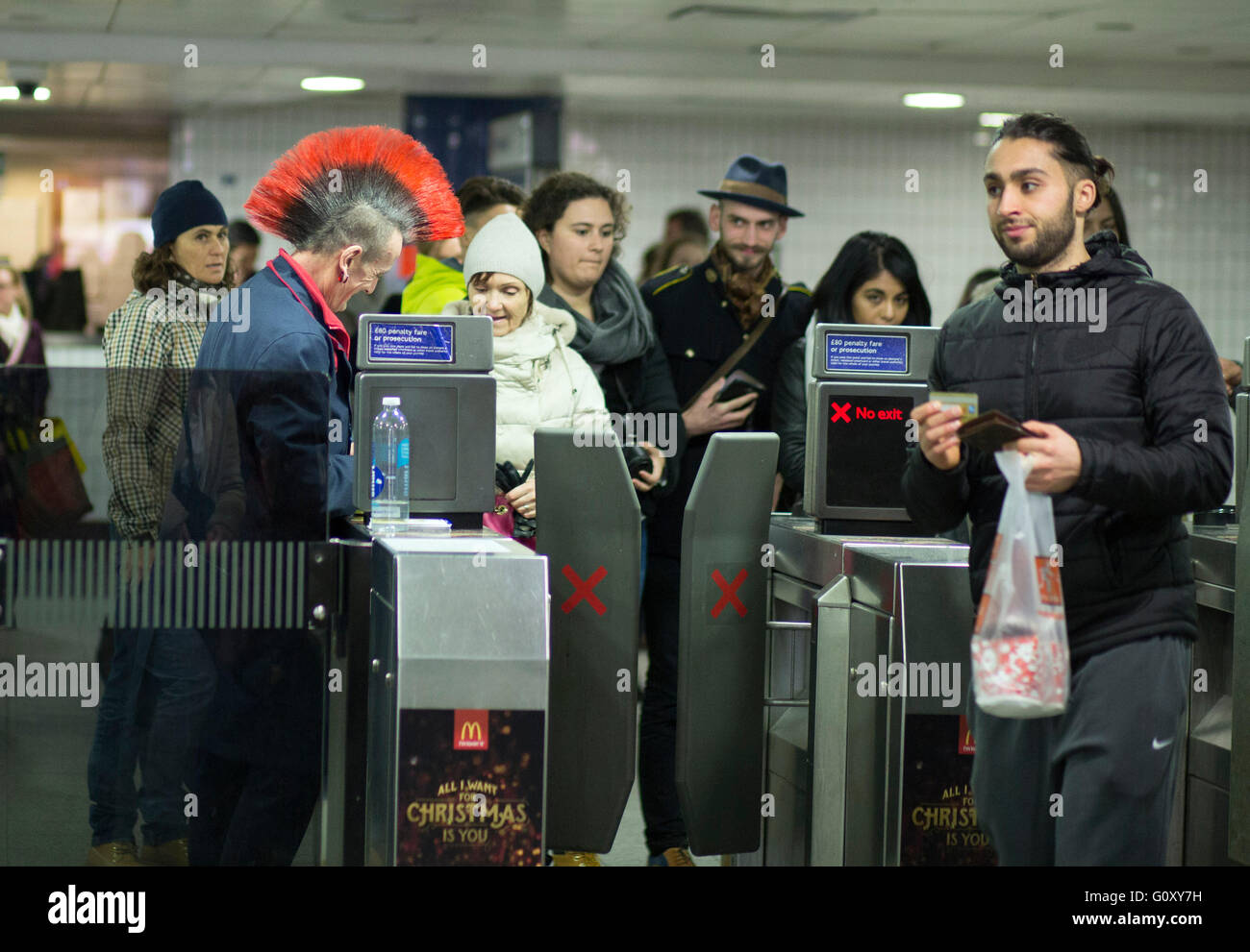 Tube underground worker hairstyle mohican mohawk Stock 