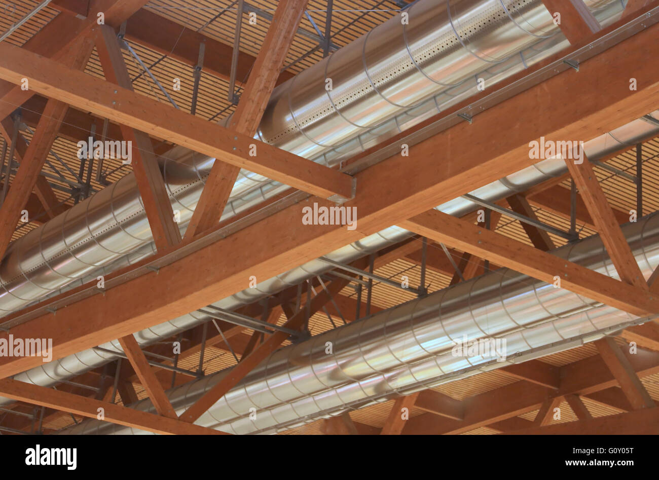 big tubes of an HVAC with roof with wooden beams in the new factory Stock  Photo - Alamy