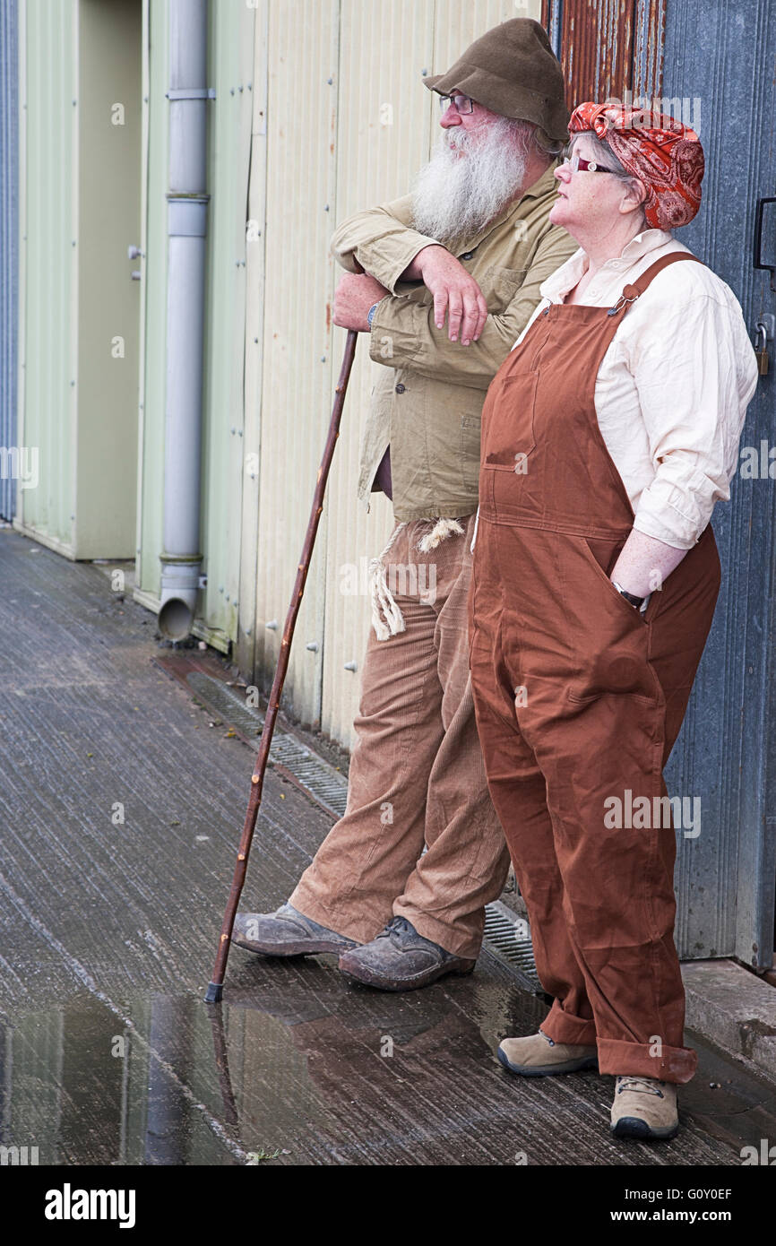 Couple In Fancy Dress As 2nd World War Time Country Bumpkins Or