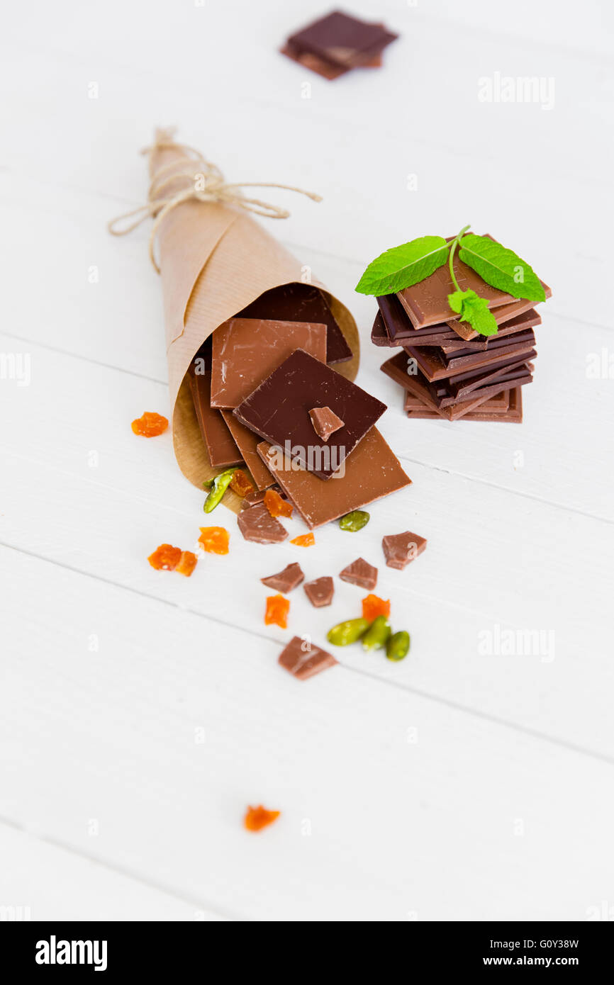 Pieces of chocolate with dried fruit and nuts Stock Photo