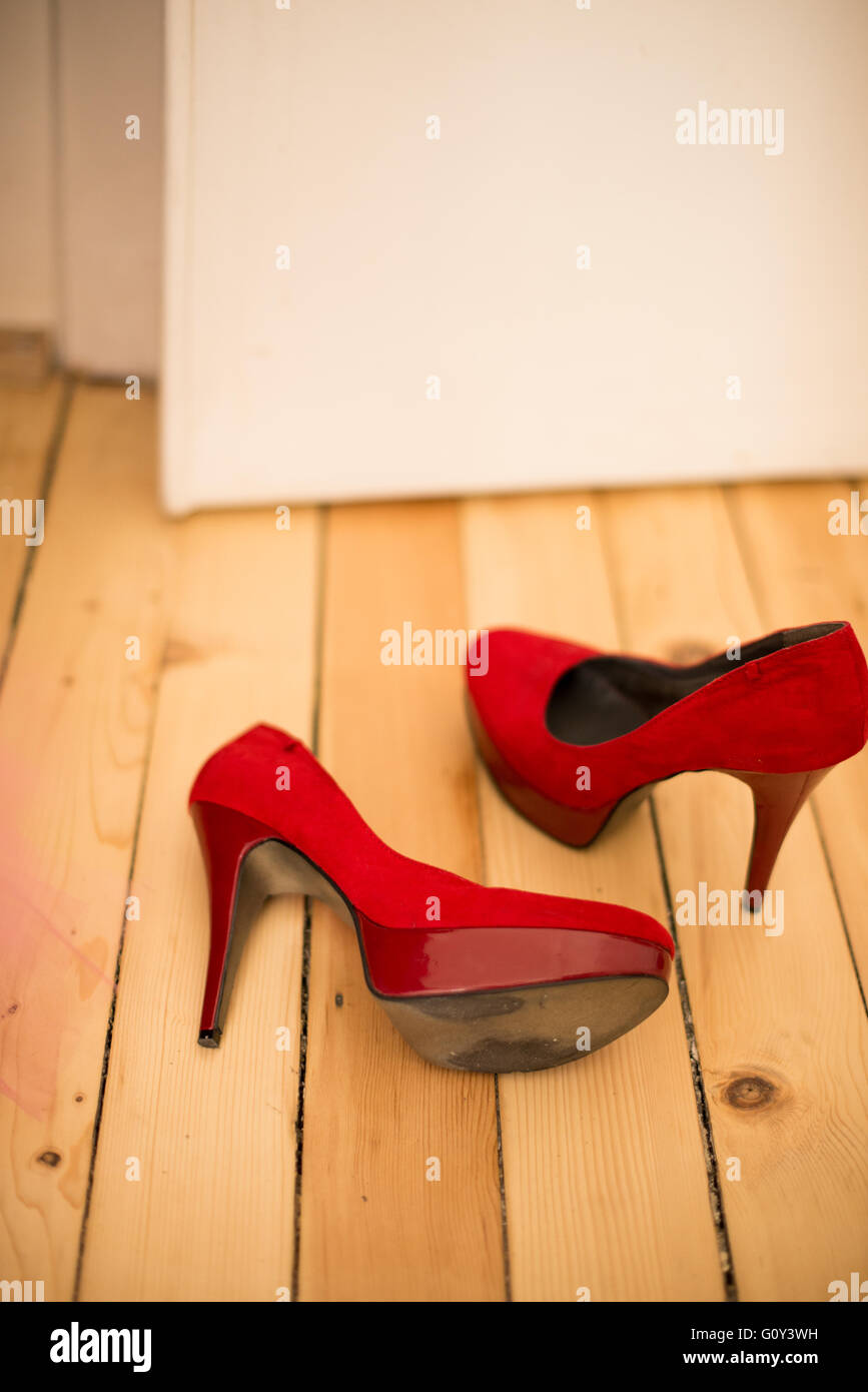 Close-up of pair of red stiletto shoes Stock Photo