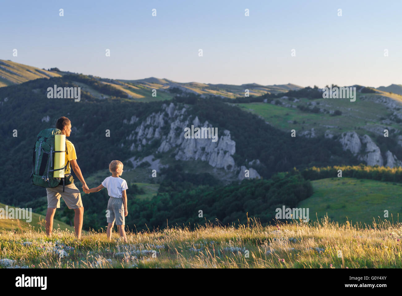 Father and son hiking Stock Photo