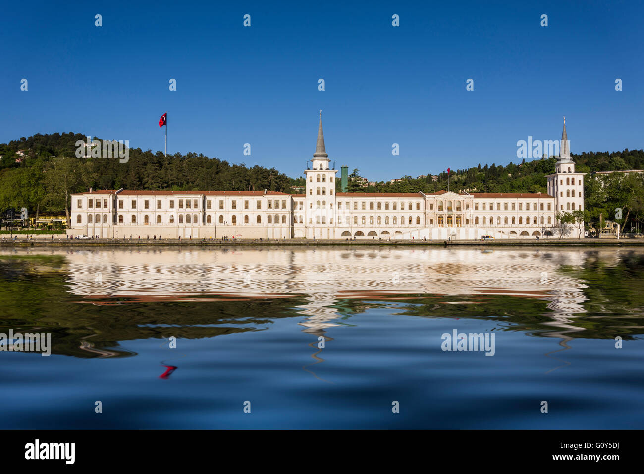 Istanbul, Turkey - April 21, 2016. Kuleli military high school with a reflection over the sea. Reflection is computer generated Stock Photo