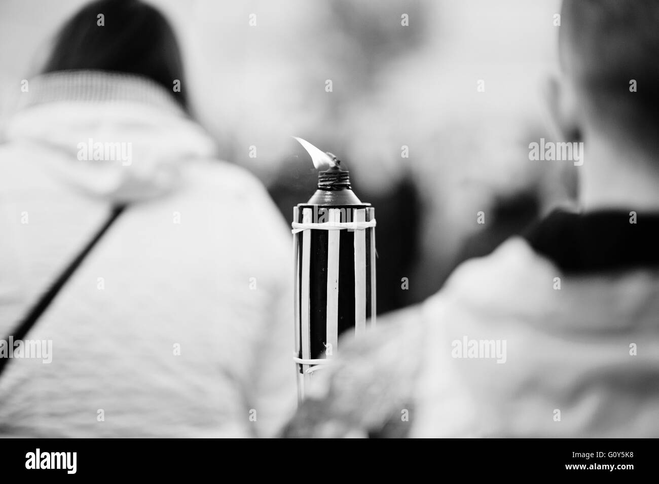 LVIV, UKRAINE - APRIL 27, 2016: Holy Week passion and death of Jesus Christ. Torch in hand fakir. Black and white Stock Photo