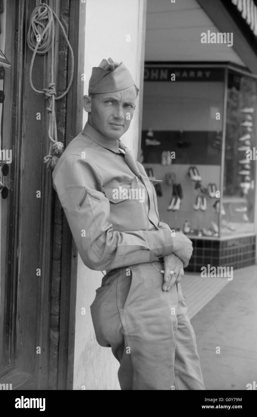 Soldier from Fort Benning on Street, Columbus, Georgia, USA, by Jack Delano for Office of War information, May 1941 Stock Photo