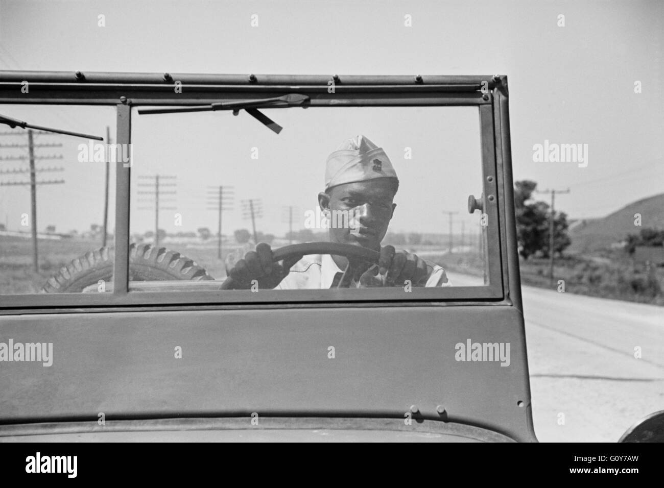 Driver of Jeep of a Reconnaissance Unit, Fort Riley, Kansas, USA, by Jack Delano for Office of War Information, April 1942 Stock Photo