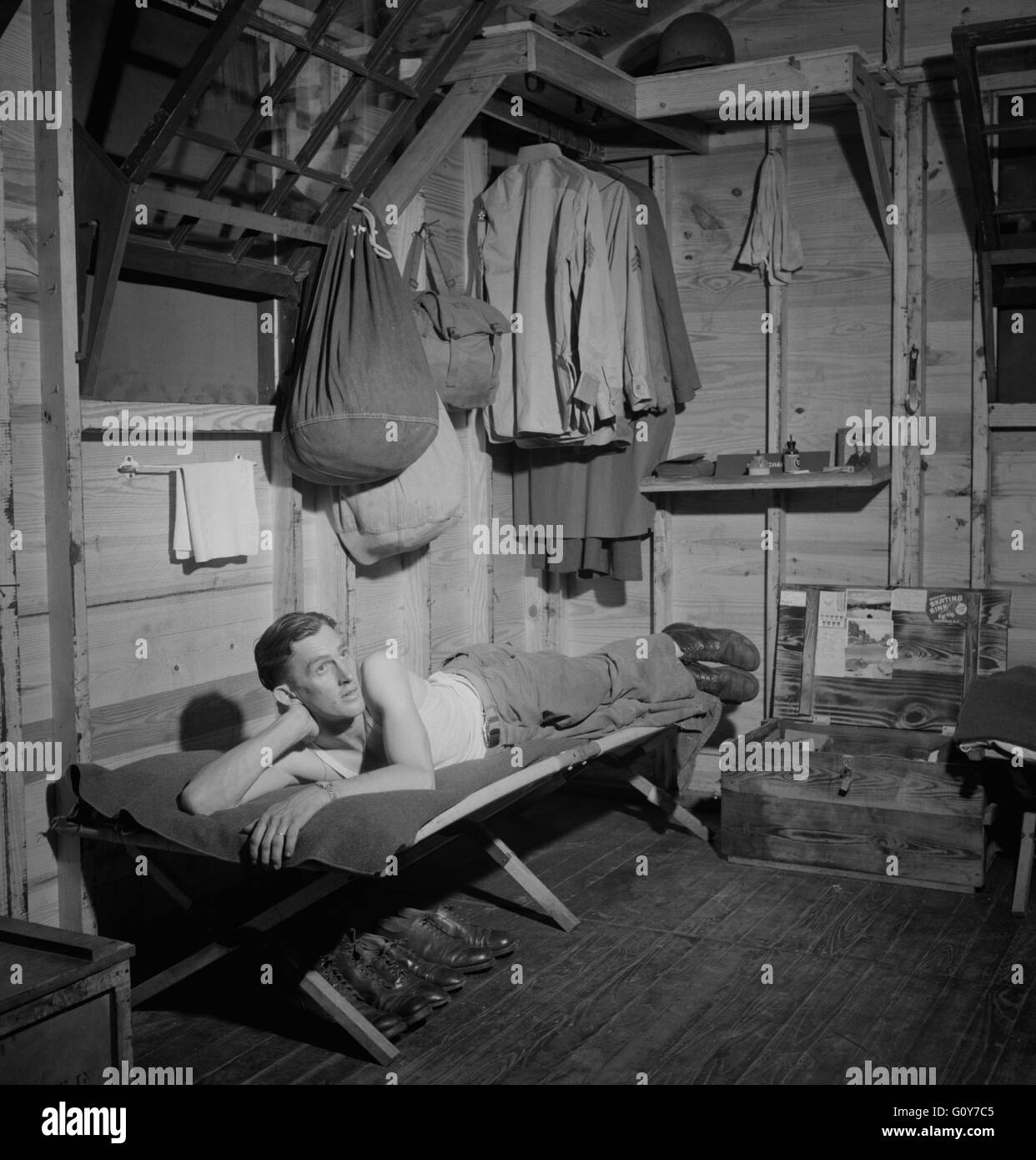 Enlisted Man of the 25th Service Group relaxing on his cot, Air Service Command, Greenville, South Carolina, USA, Jack Delano, U.S. Office of War Information, July 1943 Stock Photo