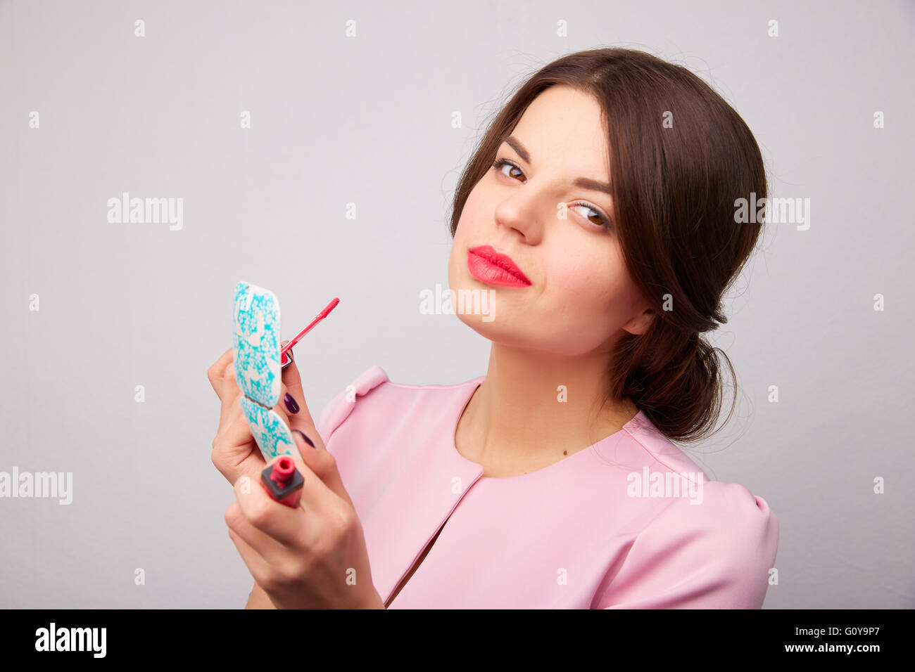 girl gets lipstick Stock Photo Alamy
