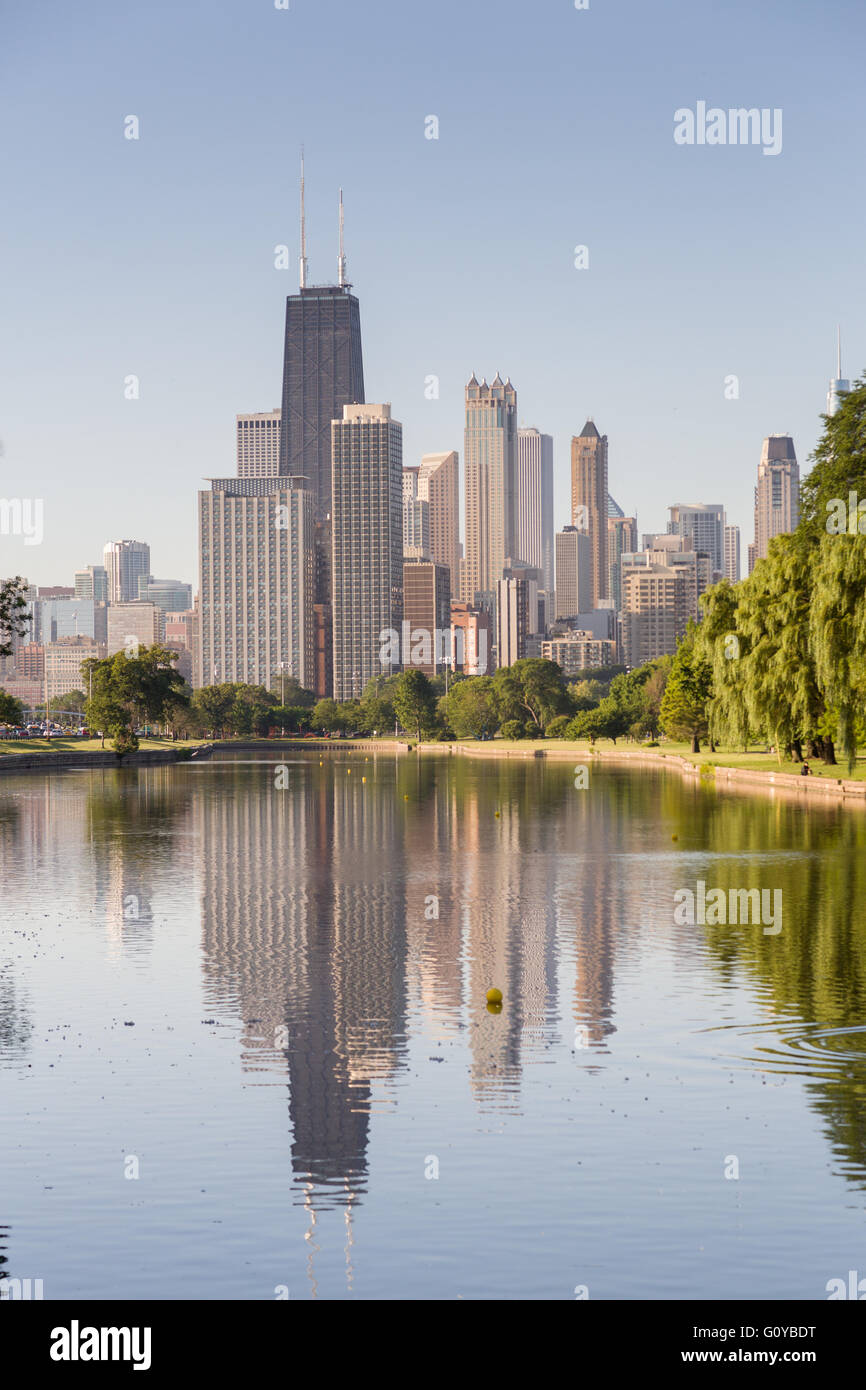 Skyline of Chicago reflected in the South Lagoon at Lincoln Park in Chicago, Illinois, USA Stock Photo