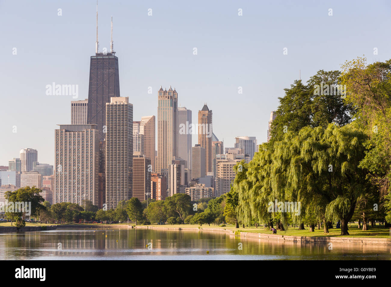 Skyline of Chicago reflected in the South Lagoon at Lincoln Park in Chicago, Illinois, USA Stock Photo