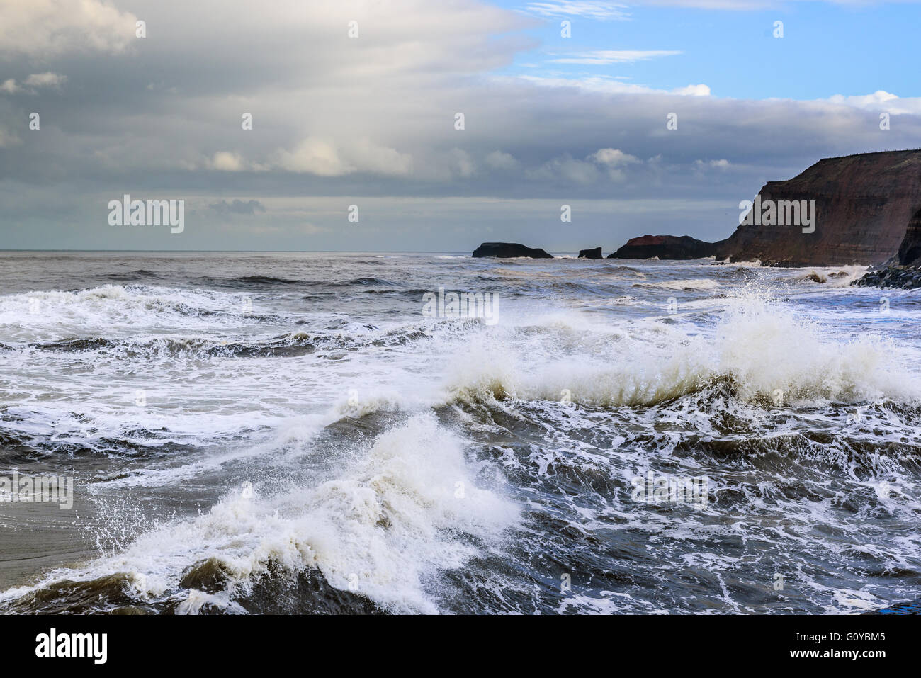 The dangerous seas of the northern coast of Great Britain,with huge breakers crashing around you. Stock Photo