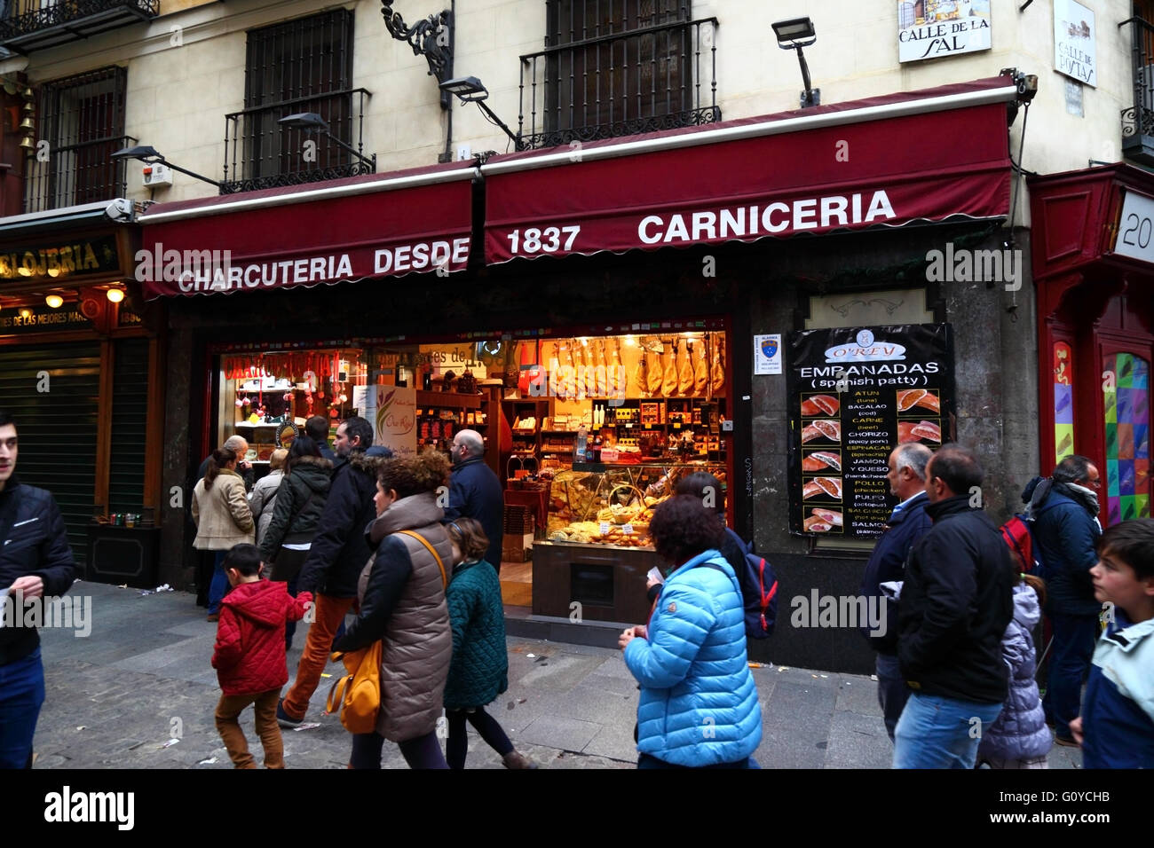 Traditional charcuteria delicatessen food shop in central Madrid, Spain Stock Photo