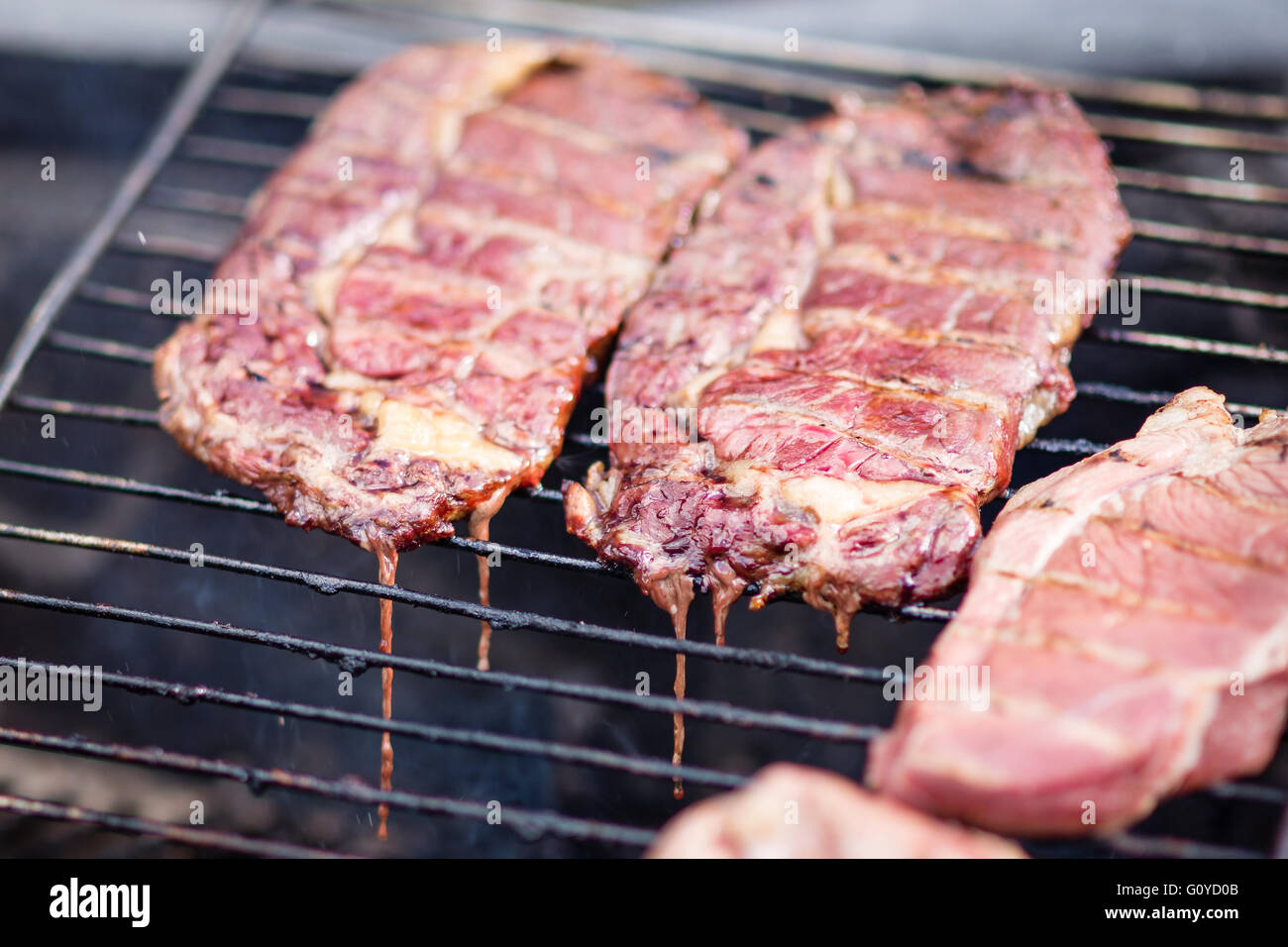 Outdoor grilled sirloin steaks (barbecue Stock Photo Alamy