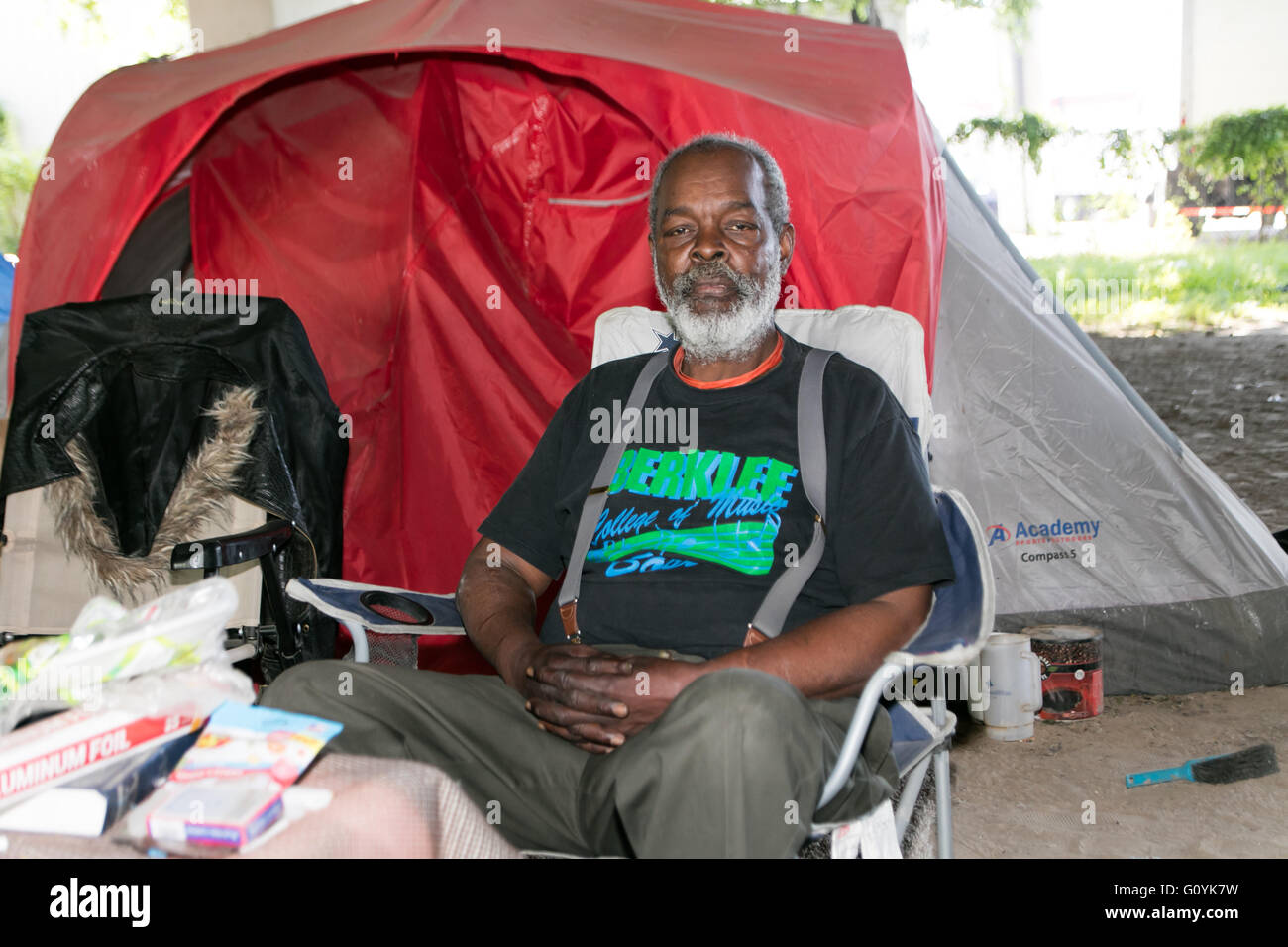 Dallas, USA. 5th May, 2016. Homeless man John Williams, 64, sits under
