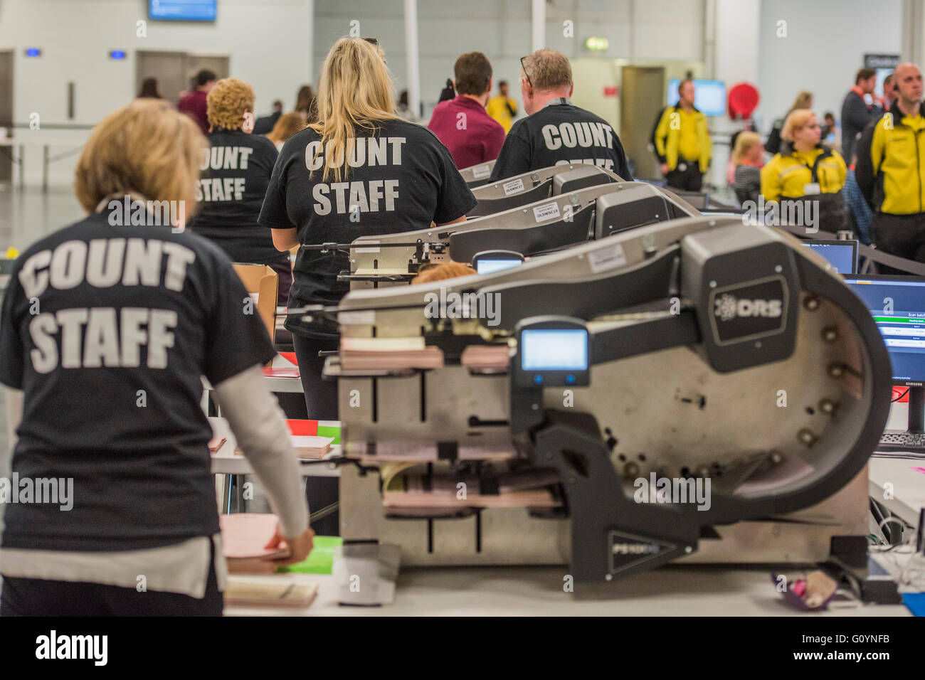 London, UK. 6th May, 2016. The DRS count machines operated by colour coded count staff - The counts for the Mayor of London and Assembly members is carried out by a mixture of machines and people at Olympia, London. The machines are run by DRS, Data & research Services plc. Credit:  Guy Bell/Alamy Live News Stock Photo