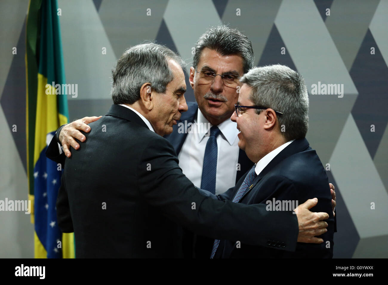 (160506) -- BRASILIA, May 6, 2016 (Xinhua) -- Senator Raimundo Lira (L), member of Brazilian Democratic Movement Party (PMDB) and the president of a special senate committee that will consider Brazil's President Dilma Rousseff's impeachment, Senator Romero Juca (C) from PMDB, and Senator Antonio Anastasia (R), member of Brazilian Social Democratic Party (PSDB) and the rapporteur of the committee, have talks during the vote session of the report on impeachment proceedings in Brasilia, Brazil, on May 6, 2016. A Brazilian Senate committee voted on Fiday in favor of opening an impeachment against Stock Photo