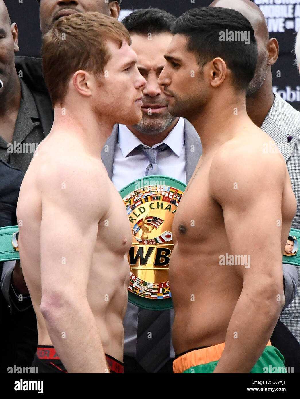 Las Vegas, Nevada, USA. 6th May, 2016. Mexico's CANELO ALVAREZ, (left), faces off with UK's AMIR KHAN at todays weigh-in at the T-Mobile arena Friday. Canelo Alvarez and Amir Khan both weighed in at 155 pounds, as the two will be fighting for the middleweight world championship this Saturday May 7th at the T-Mobile arena and on HBO PPV. Credit:  Gene Blevins/ZUMA Wire/Alamy Live News Stock Photo