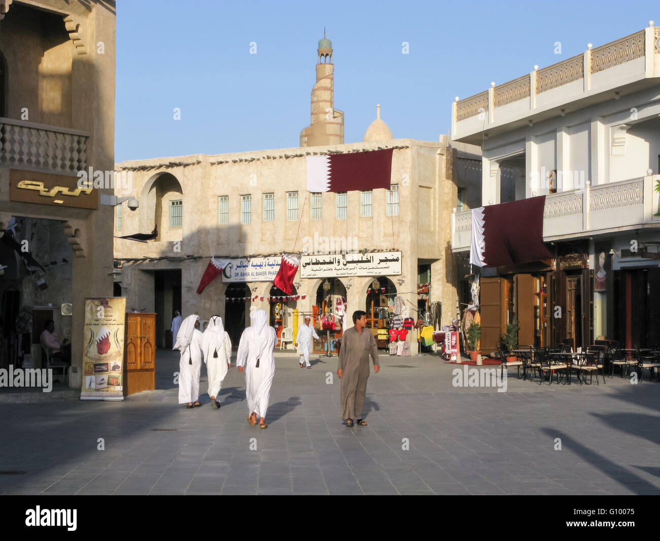 People in shopping street in downtown Doha, Qatar Stock Photo