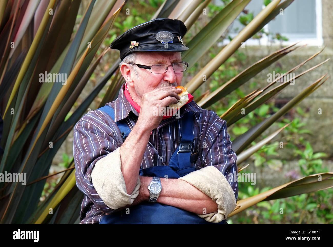 A steam engine enthusiast taking a break Stock Photo