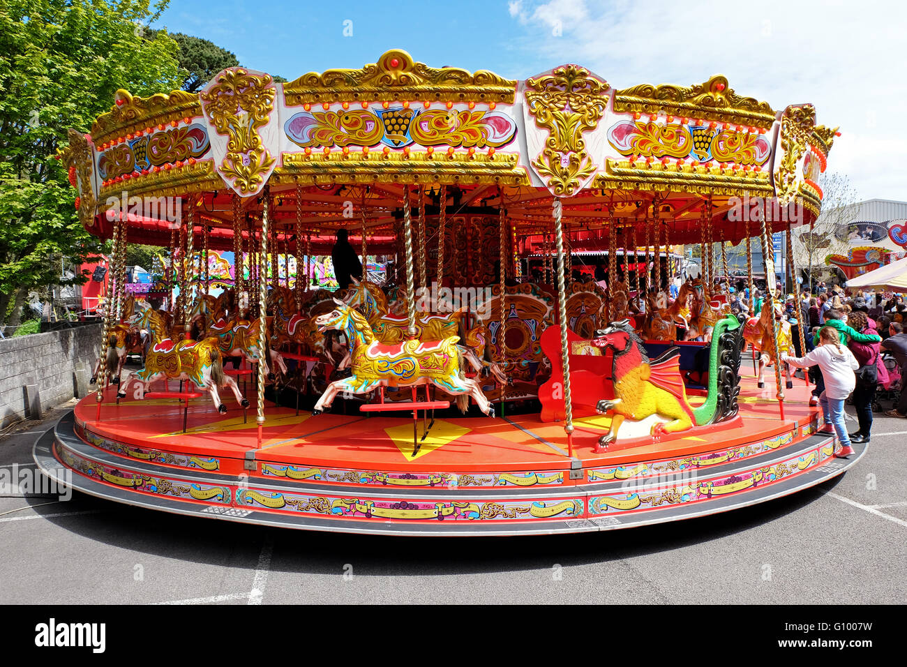 A Merry go round at a funfair in the UK. Stock Photo