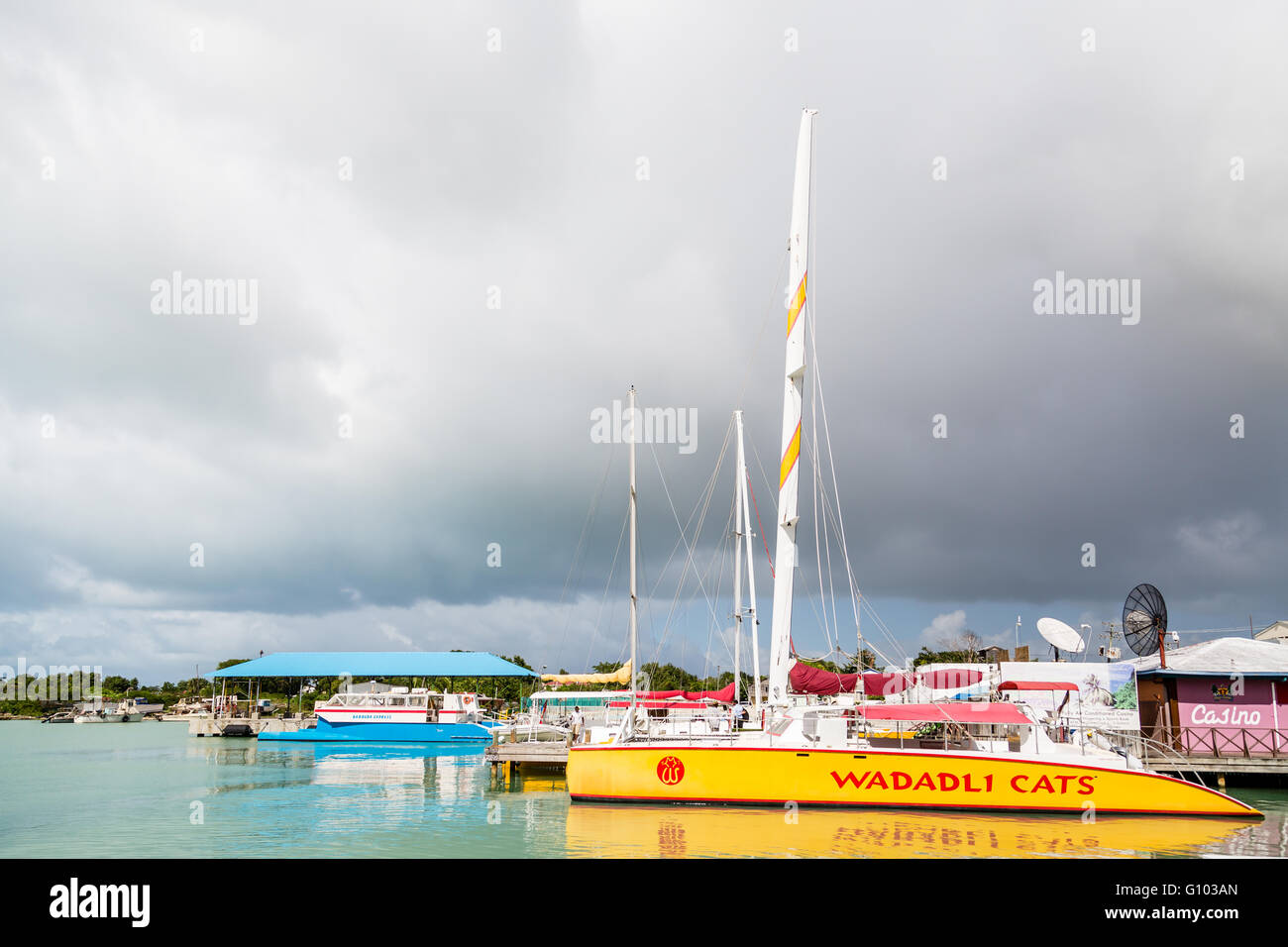 Wadaldi Cat Docked at Antigua with tour boats Stock Photo