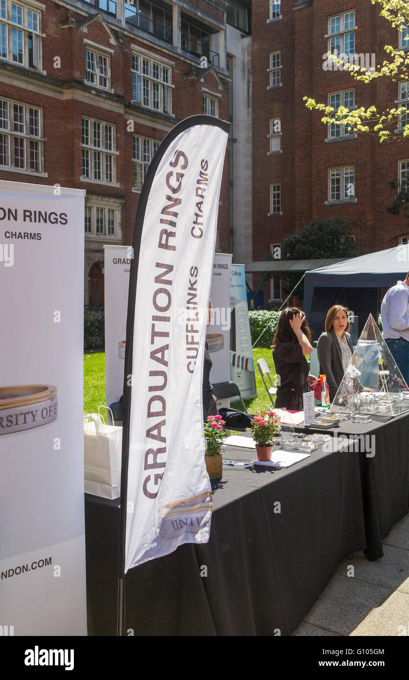 Stall selling graduation rings and other souvenirs at Imperial College postgraduate graduation ceremony, South Kensington, London Stock Photo