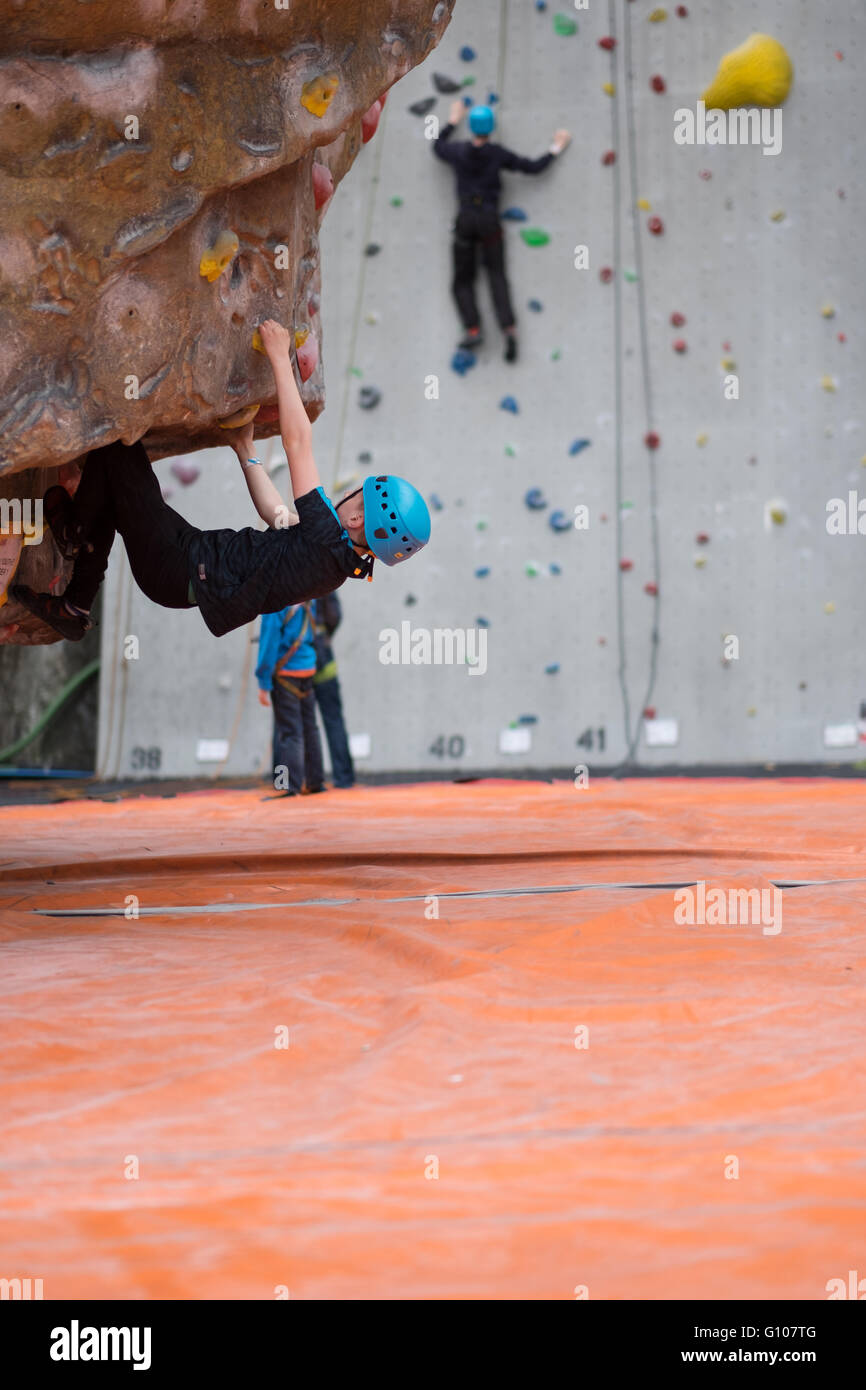 Climber bouldering at an indoor rock climbing centre in Ratho Edinburgh