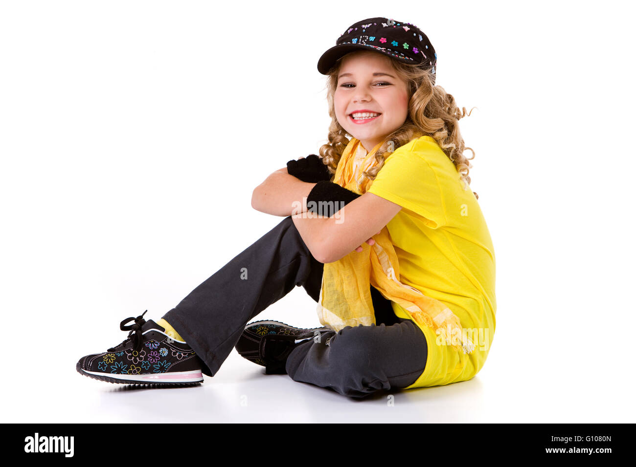 Little girl dancer in various costumes, isolated on white Stock Photo