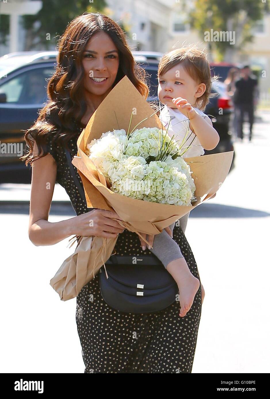 Terri Seymour and Clark Mallon visit Bristol Farms with their daughter