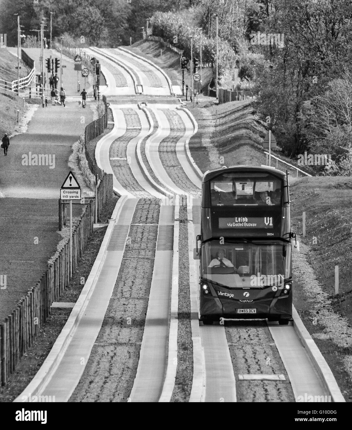 Approaching bus on new dedicated guided busway Stock Photo