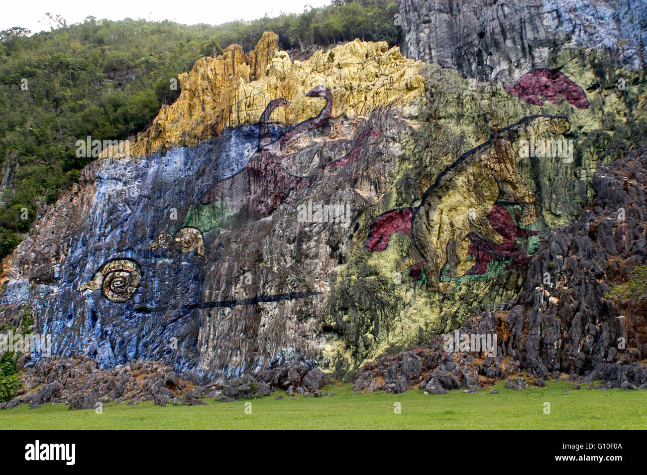 Vinales, Valley in Pinar del Rio, Cuba is a Unesco World Heritage site since 1999 The Prehistory mural painted in the wall of a Stock Photo