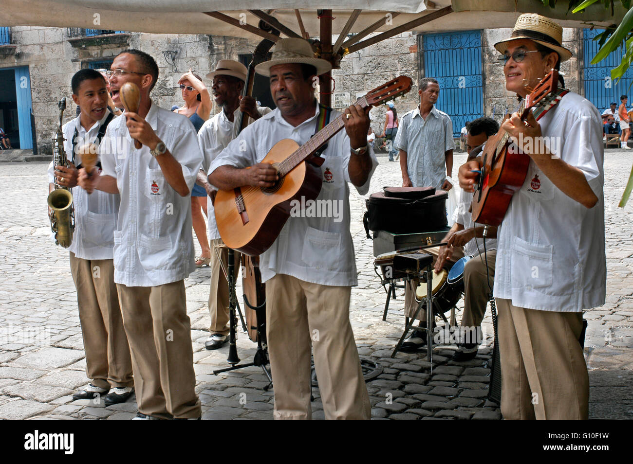 Musicians Play Cuban Rhythms on the Streets of Havana. Music, Old Habana, Cuba. Music band playing outside a restaurant, Havana Stock Photo