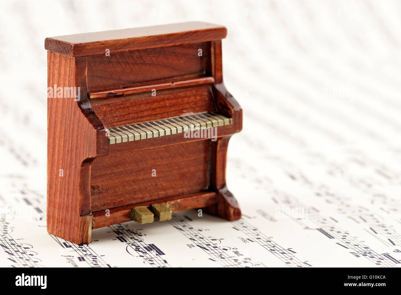 Miniature of a upright piano. Stock Photo
