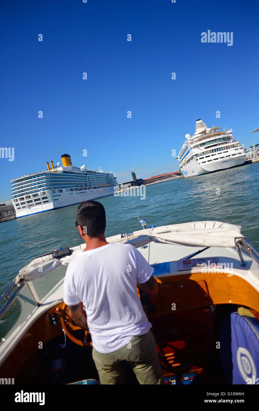 Arriving on taxi boat to the Maritime Station, where cruise ships are moored, Venice, Italy Stock Photo