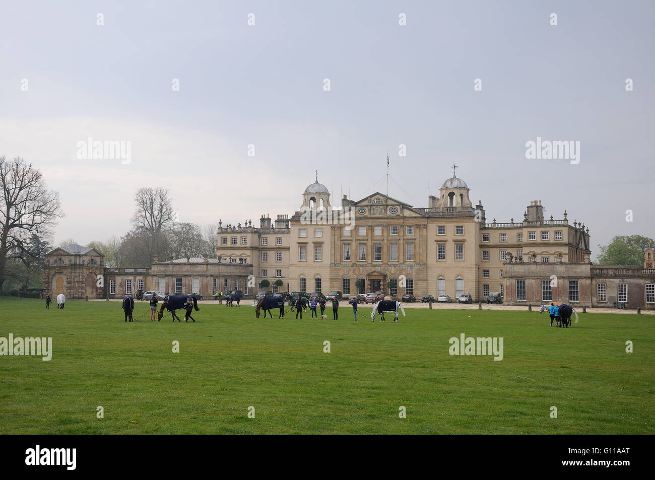 Badminton, UK. 07th May, 2016. The 2016 Mitsubishi Motors Badminton Horse Trials. Horses grazing in front of Badminton House ahead of the Cross Country Phase on Day 3 of the Mitsubishi Motors Badminton Horse Trials which take place 5th - 8th May. Credit:  Jonathan Clarke/Alamy Live News Stock Photo