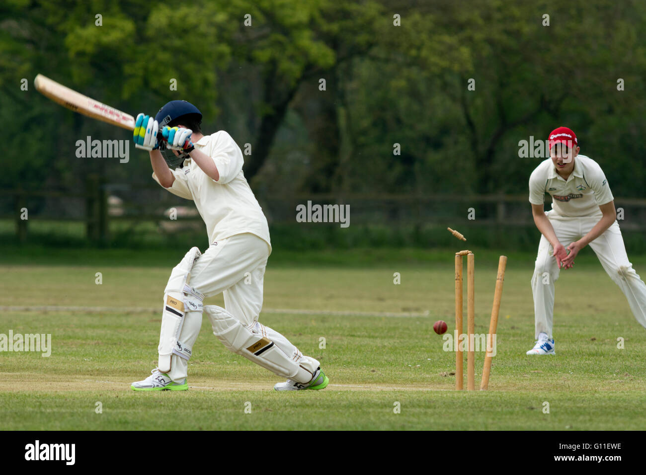 Welford-on-Avon, Warwickshire, UK. 07th May, 2016. Players enjoy the warm sunshine on the opening day of the Cotswold Hills Cricket League. In a Division 5 fixture between Welford-on-Avon and Ashton-under-Hill, a visiting batsman is clean bowled. Credit:  Colin Underhill/Alamy Live News Stock Photo