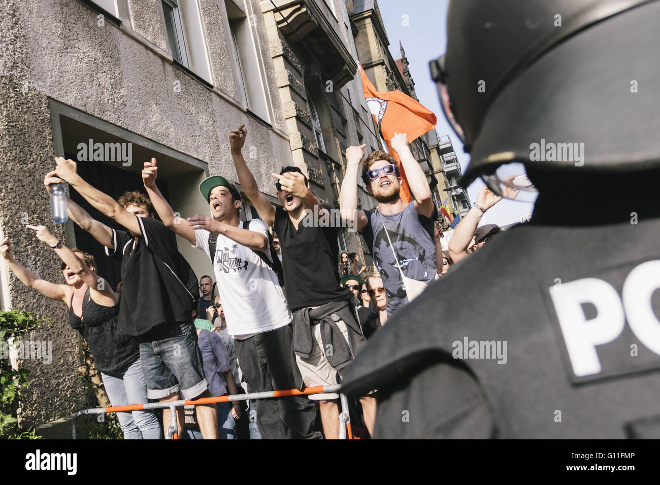 Berlin, Germany. 7th May, 2016. Activists during the counter protests against the rally held under the motto 'Merkel muss weg![Merkel must go]' organised by far-right group 'We for Berlin & We for Germany' Credit:  Jan Scheunert/ZUMA Wire/Alamy Live News Stock Photo
