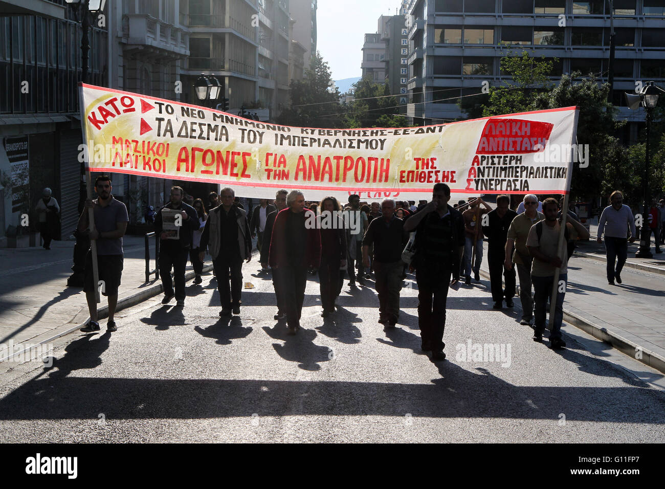 Athens, Greece. 7th May, 2016. Members of the trade union PAME participate during a 48-hour nationwide general strike against tax and pension reform bills that the government promotes in exchange of further aid by international lenders, in Athens, Greece, May 7, 2016. Credit:  Marios Lolos/Xinhua/Alamy Live News Stock Photo