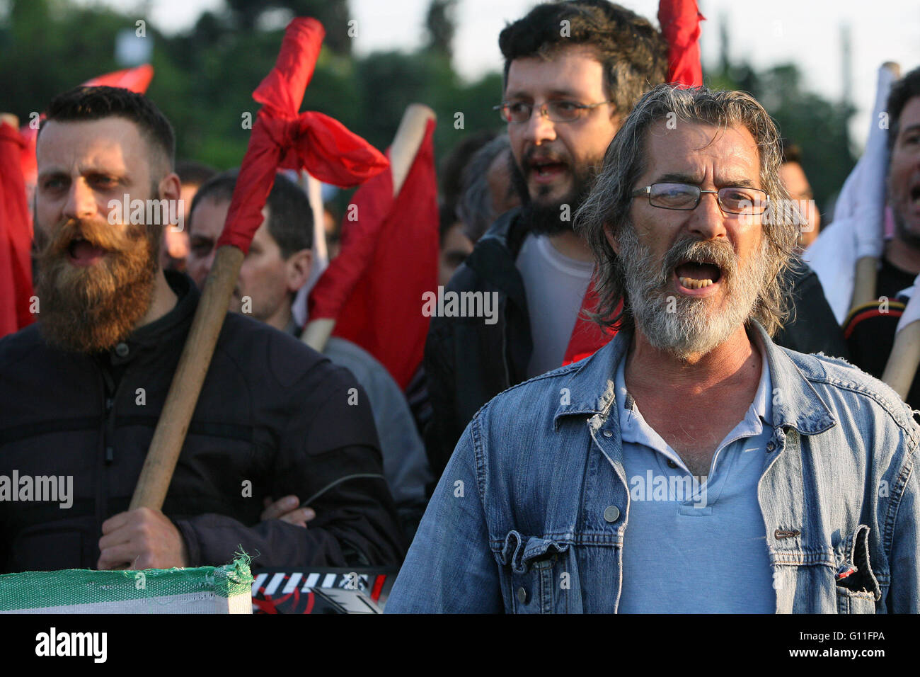 Athens, Greece. 7th May, 2016. Members of the trade union PAME shout slogans during a 48-hour nationwide general strike against tax and pension reform bills that the government promotes in exchange of further aid by international lenders, in Athens, Greece, May 7, 2016. Credit:  Marios Lolos/Xinhua/Alamy Live News Stock Photo